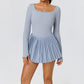 Women's premium court performance dress designed for tennis movement, breathable comfort, and elevated athletic lifestyle fashion.