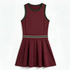 Women's tennis dress with integrated shorts, soft performance fabric, and structured fit designed for movement on court.