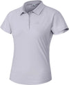 Premium women's tennis polo worn by a studio model in a minimalist setting, emphasizing polished design, breathable fabric, and movement-friendly fit.