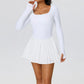 Elegant women's long sleeve tennis dress designed for athletic movement, refined comfort, and premium court-inspired style.