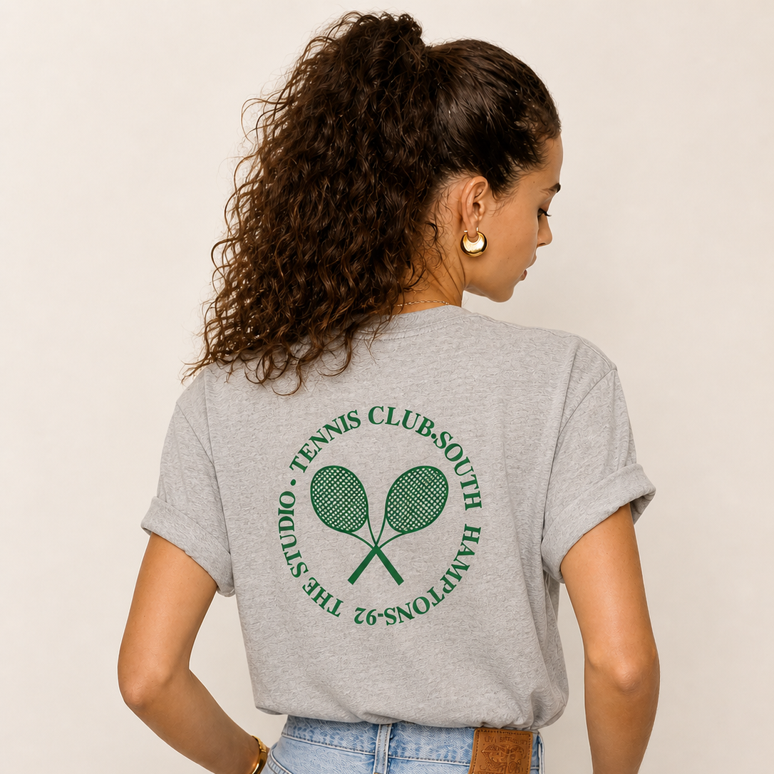Gray women’s tennis t-shirt by Clayside with front chest logo and back graphic.