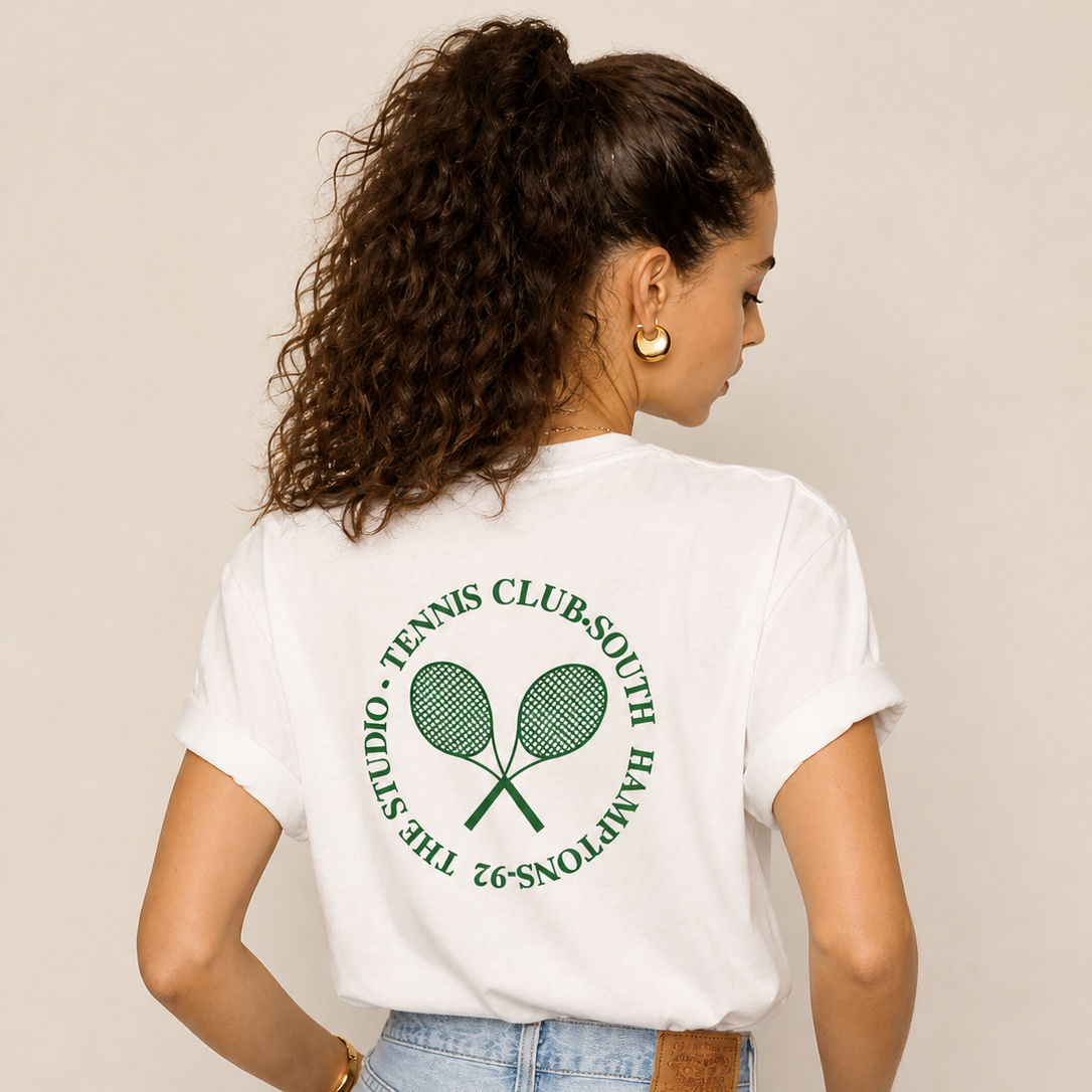 White women’s tennis t-shirt by Clayside with front logo and back graphic.